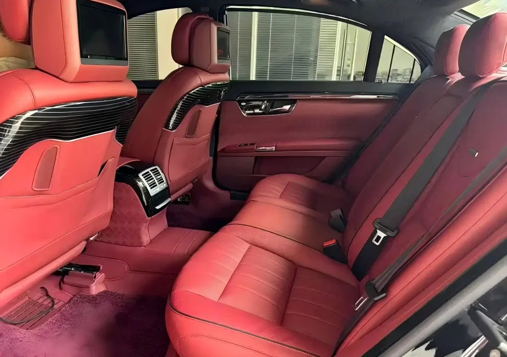 3-Modified rear “airline-style” seats in a Mercedes-Benz S-Class luxury sedan