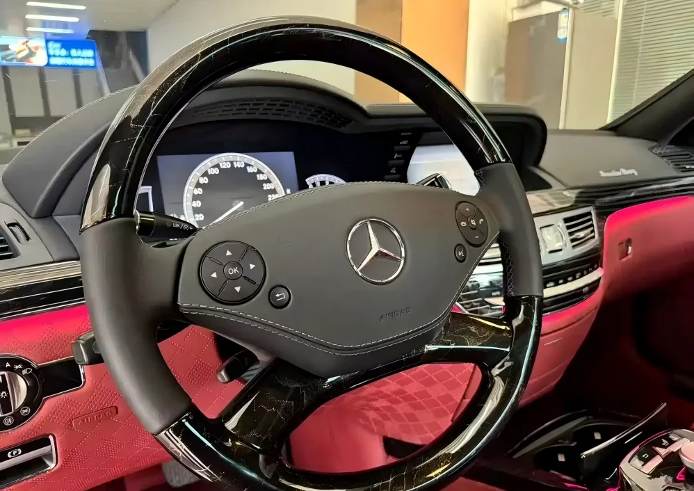 4-Modified steering wheel of a Mercedes-Benz S-Class luxury sedan