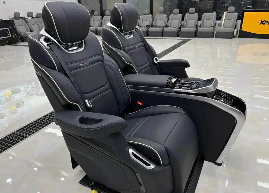 2-Side view of the modified rear seats in a Cadillac Escalade.