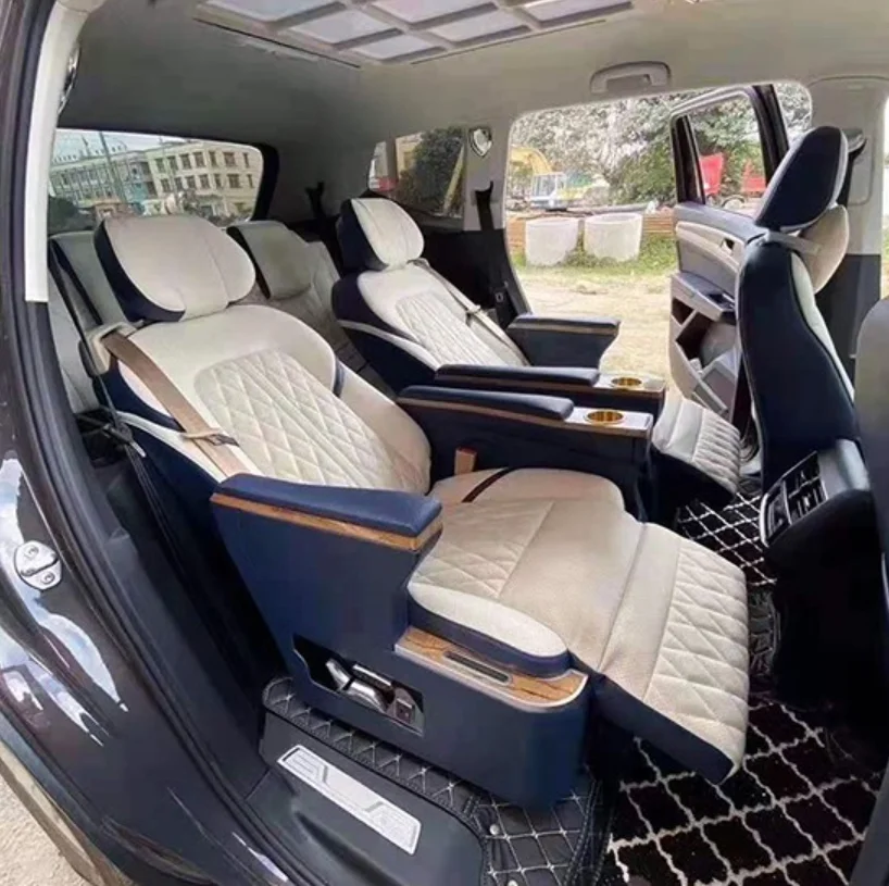 Blue white Middle-Row Aviation Seats Fully Reclined in a Volkswagen Teramont