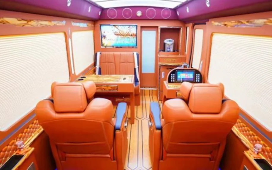 1-1-Toyota Coaster VIP bus conversion interior with luxury leather aviation seats and wooden flooring
