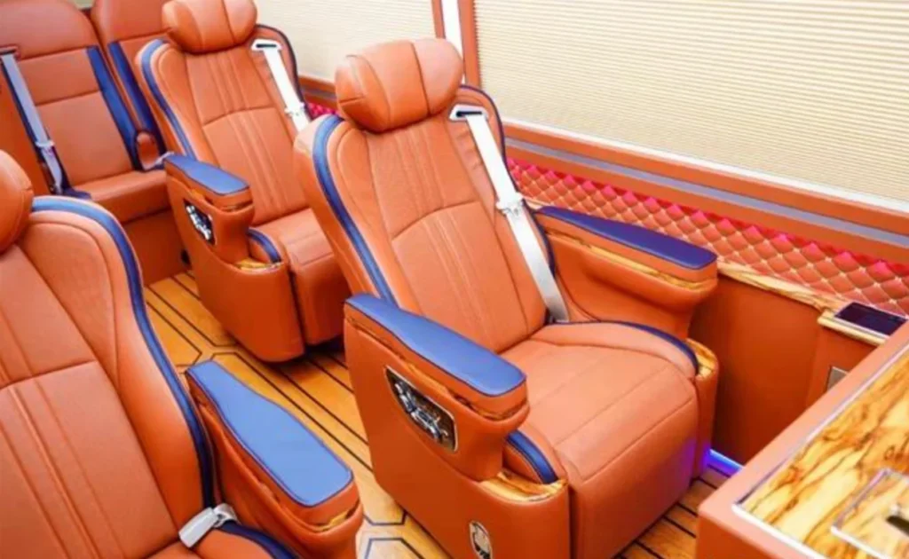 1-2-Toyota Coaster luxury interior upgrade featuring premium aviation seats with electric adjustment functions