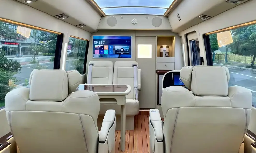 2-1-Toyota Coaster business vehicle interior with VIP leather seats and customized passenger layout