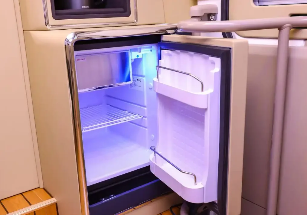 2-3-Toyota Coaster VIP interior modification with refrigerator, storage cabinet and luxury passenger space
