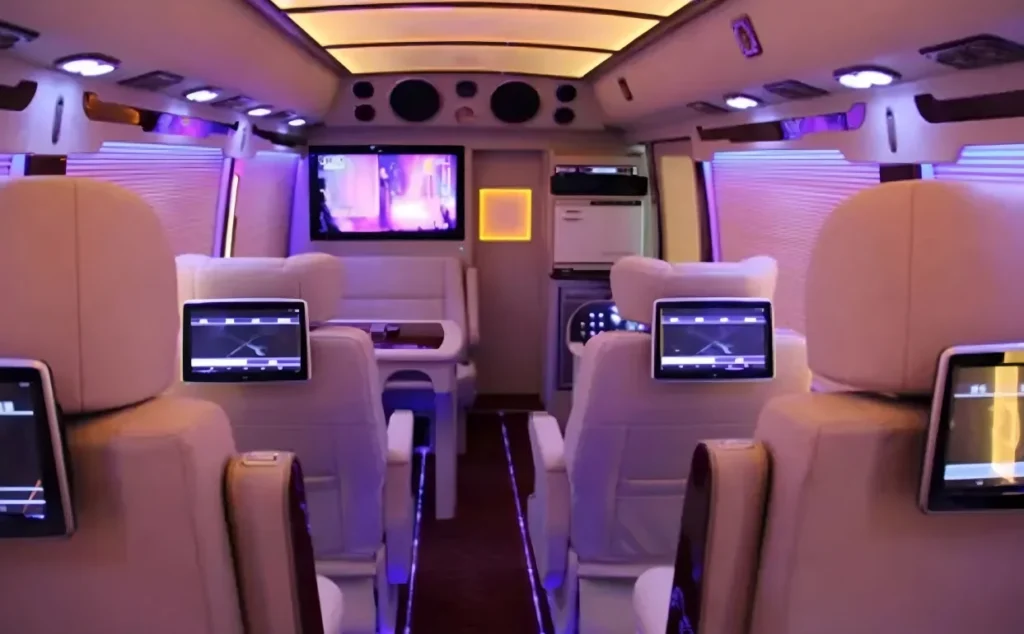 3-1-Toyota Coaster luxury bus conversion featuring executive seating layout and premium interior materials