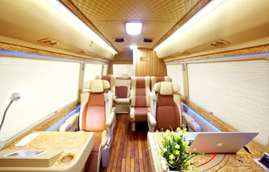 3-4-Toyota Coaster luxury interior upgrade with VIP seats, conference tables and premium cabin design
