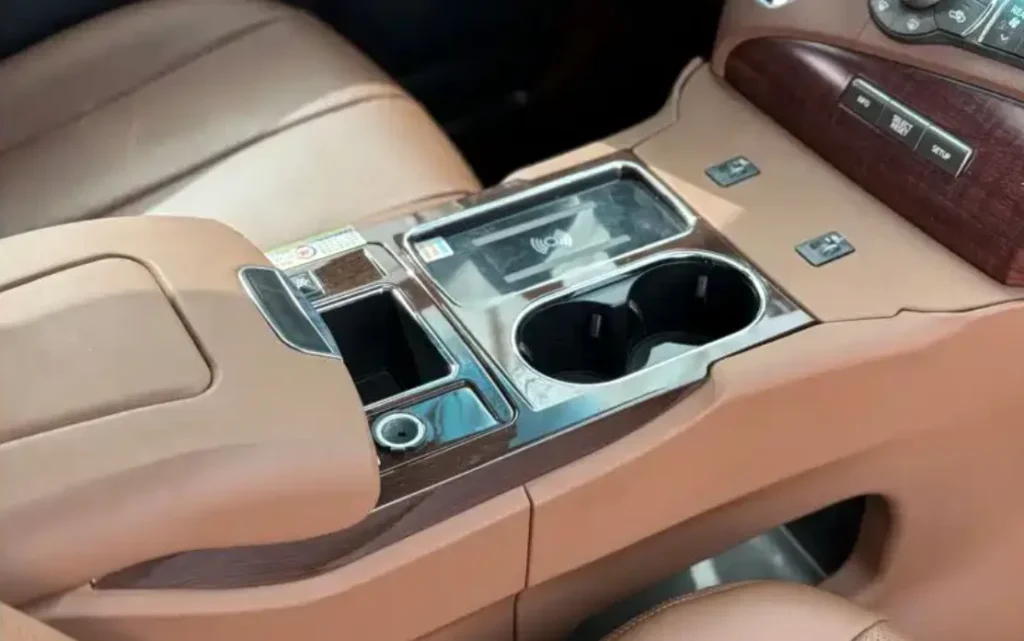 4-Toyota Sienna premium interior modification with leather wrapped steering wheel and wood grain trim