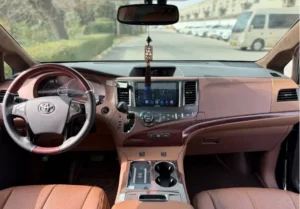 Toyota Sienna luxury modification with VIP aviation seats and premium brown leather interior